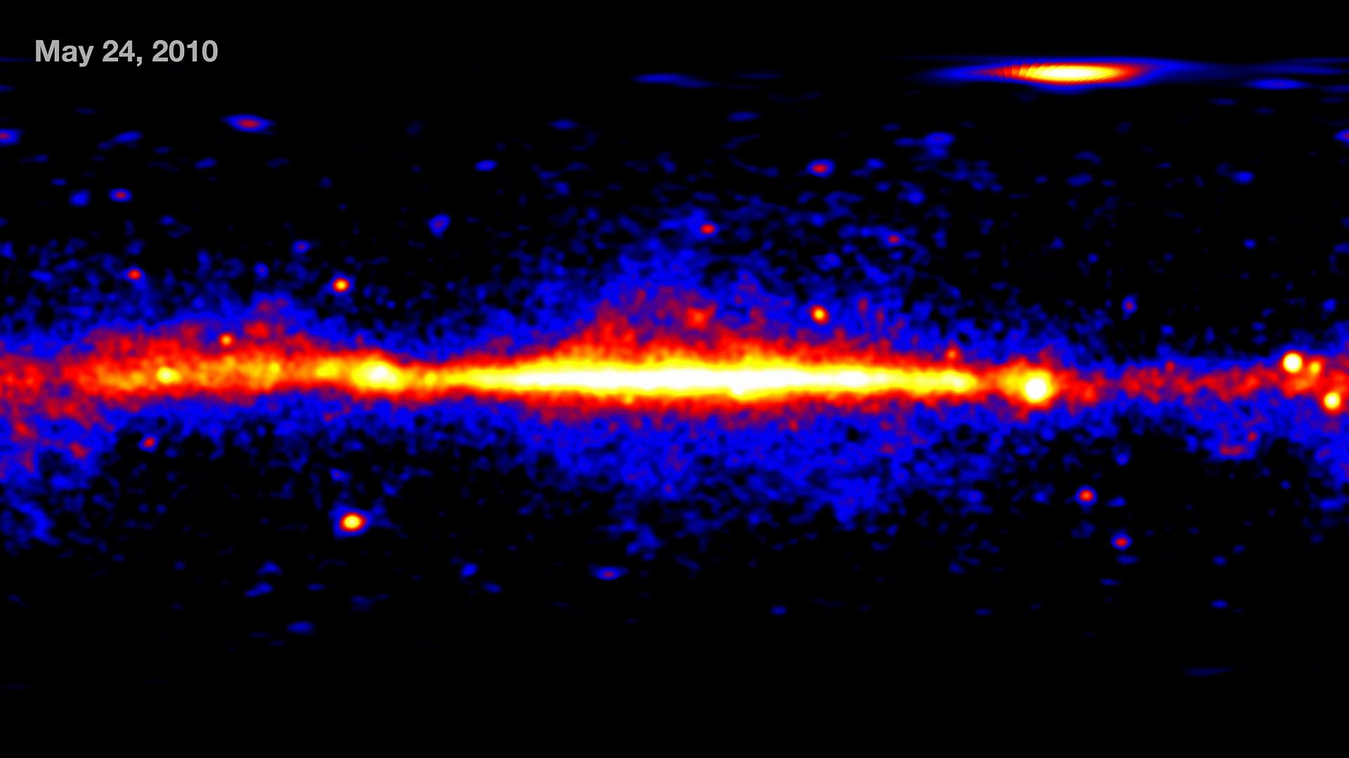 A map of the entire sky in gamma rays from NASA's Fermi telescope, with the Milky Way glowing across the center